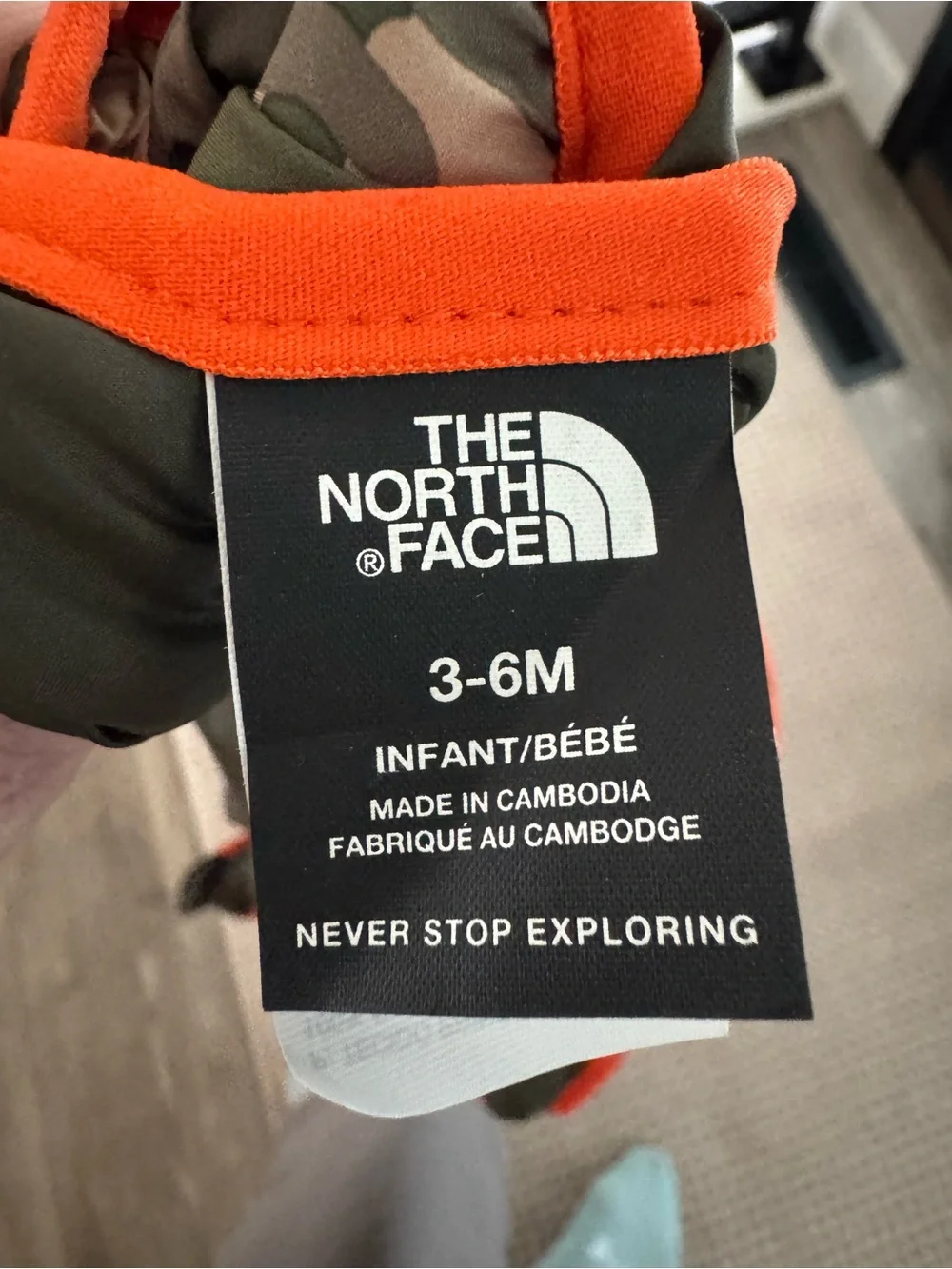 The North Face Olive Green/camo reversible Puffer Jacket with Orange Accents